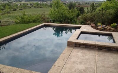 Sloped backyard with pool